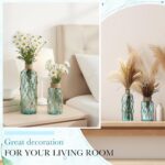 Two light blue Chuangdi coastal glass vases with boho rope, one larger and one smaller, ready for floral arrangements.