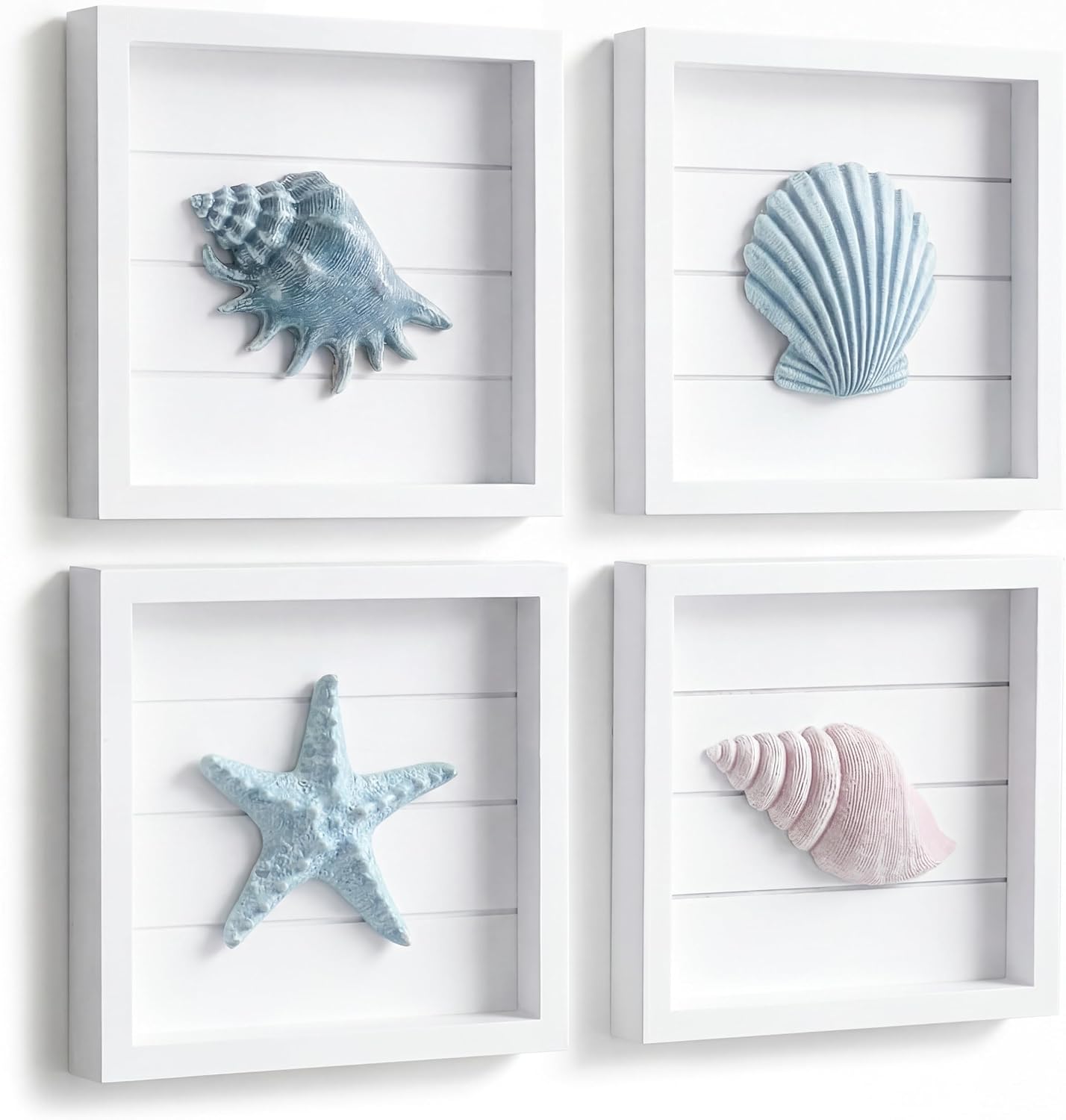 tide-and-tales-3d-coastal-wall-art-4-piece-framed-seashell-set-7-x-7-01 A set of four 7x7 inch framed 3D coastal wall art pieces featuring hand-painted seashells, conch shells, and starfish in past